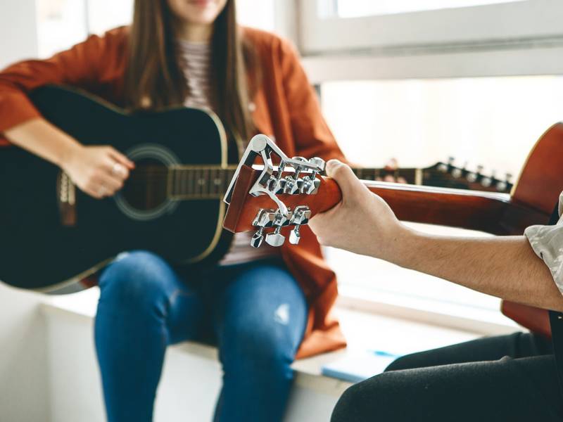 How Can Guitar Classes Help Me Enhance My Skills?